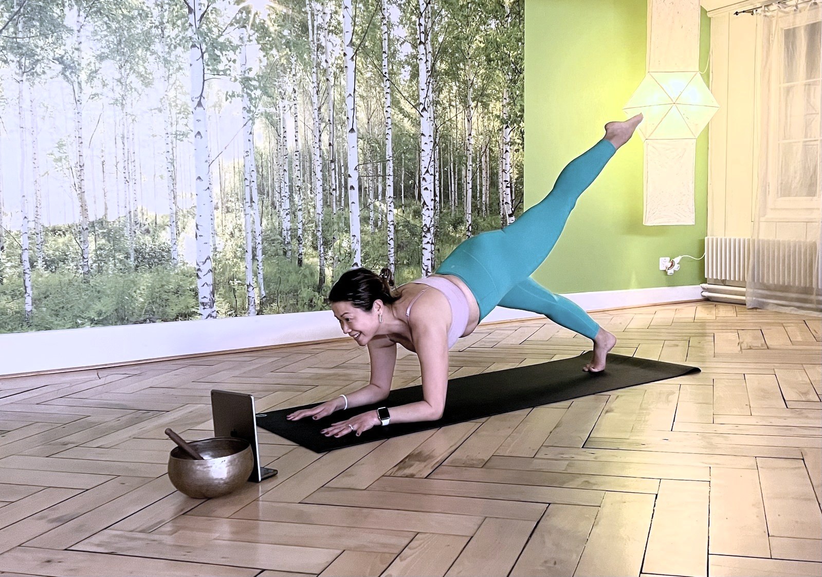 Rachel teaching a live online yoga class via video call